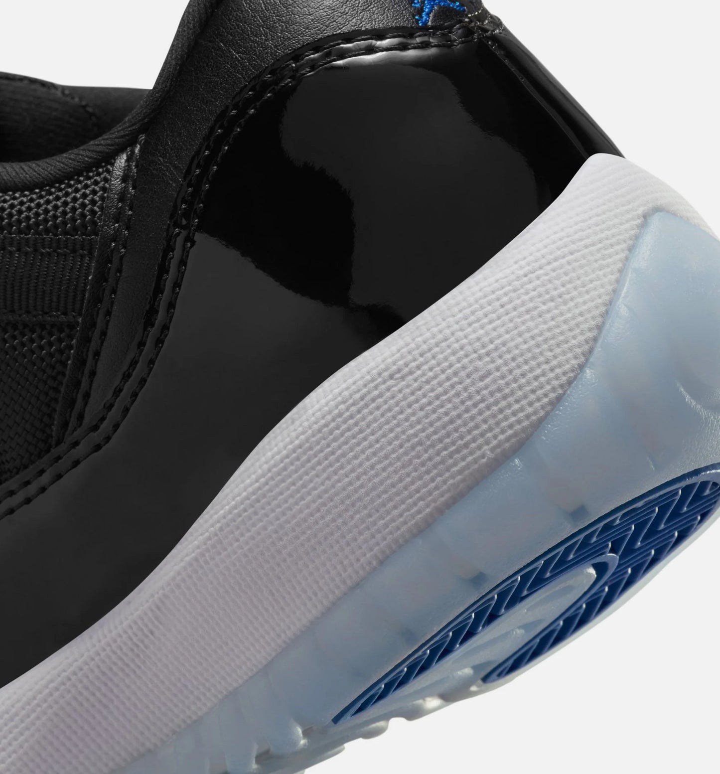 Air Jordan 11 Retro Low Black and Varsity Royal Grade School Lifestyle Shoe Black Varsity Royal White