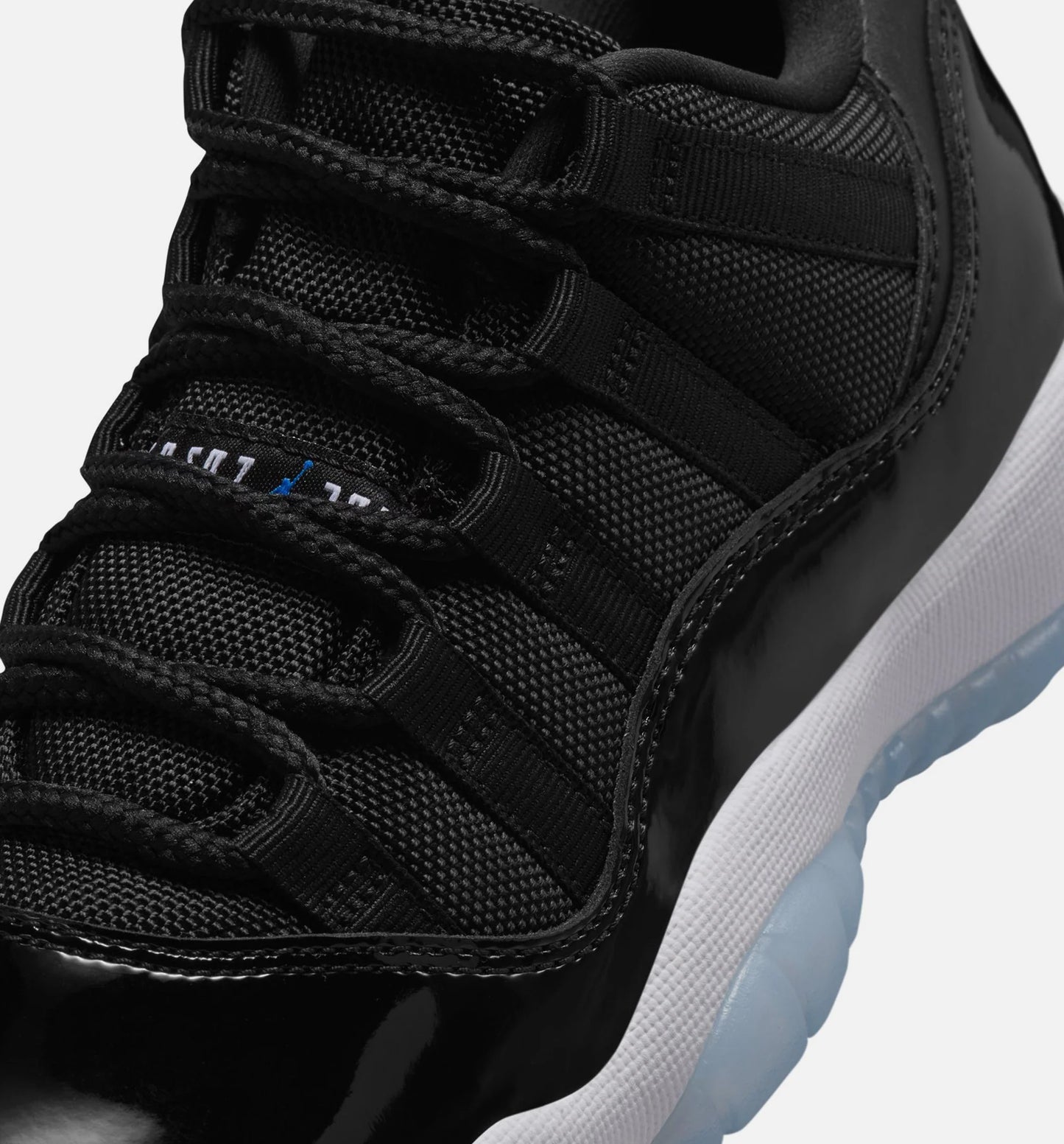 Air Jordan 11 Retro Low Black and Varsity Royal Grade School Lifestyle Shoe Black Varsity Royal White