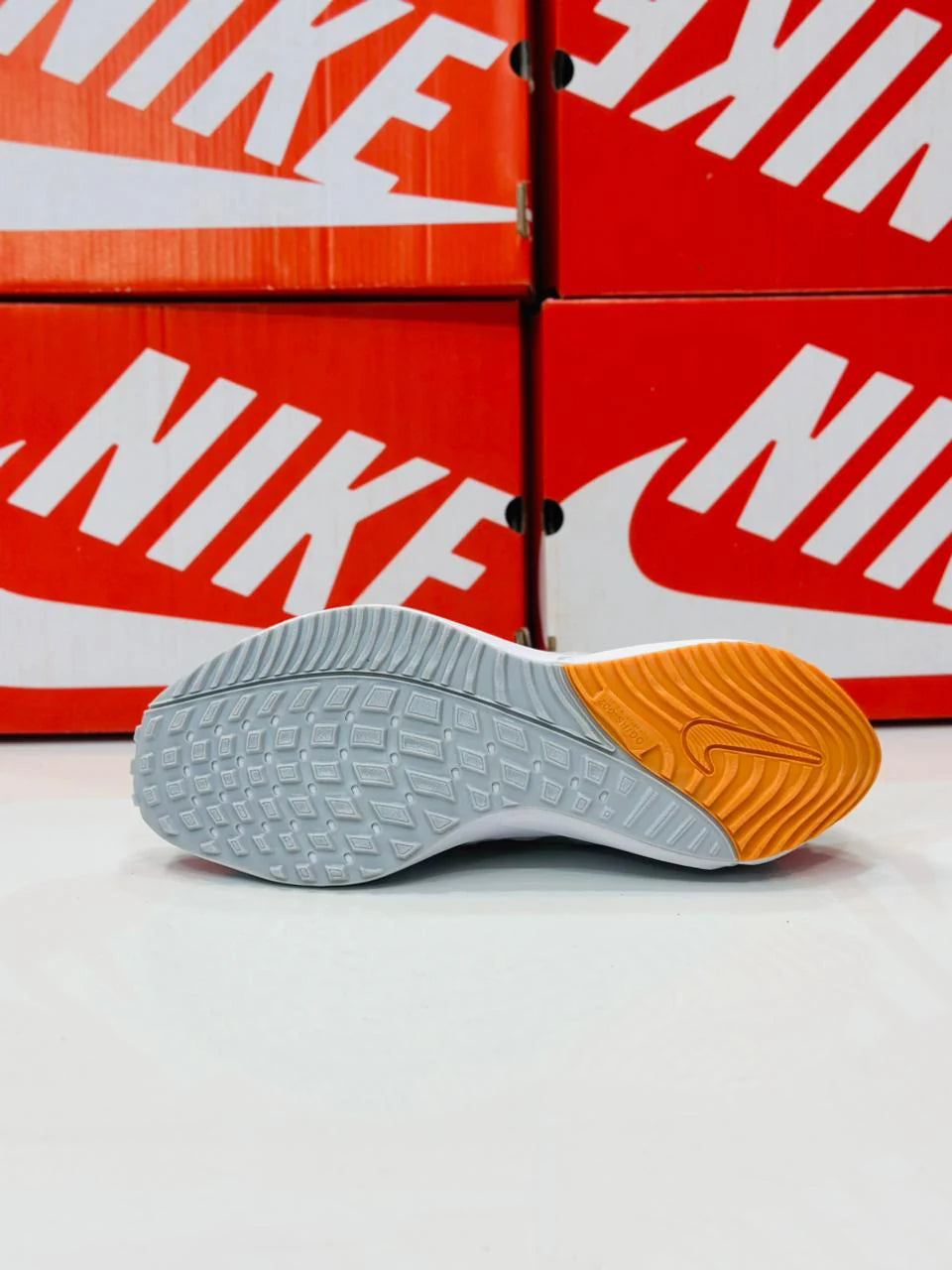 NIKE AIR ZOOM VOMERO 15 MULTI GREY AND ORANGE